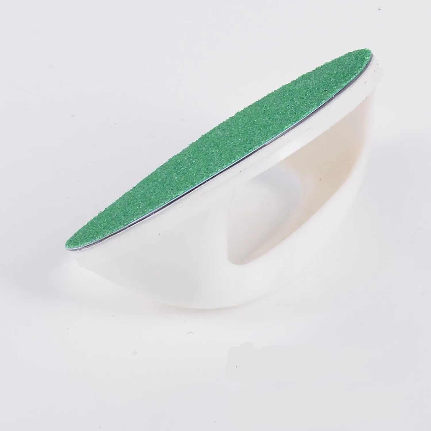 Square dog nail file with ergonomic handle in blue colour on a table