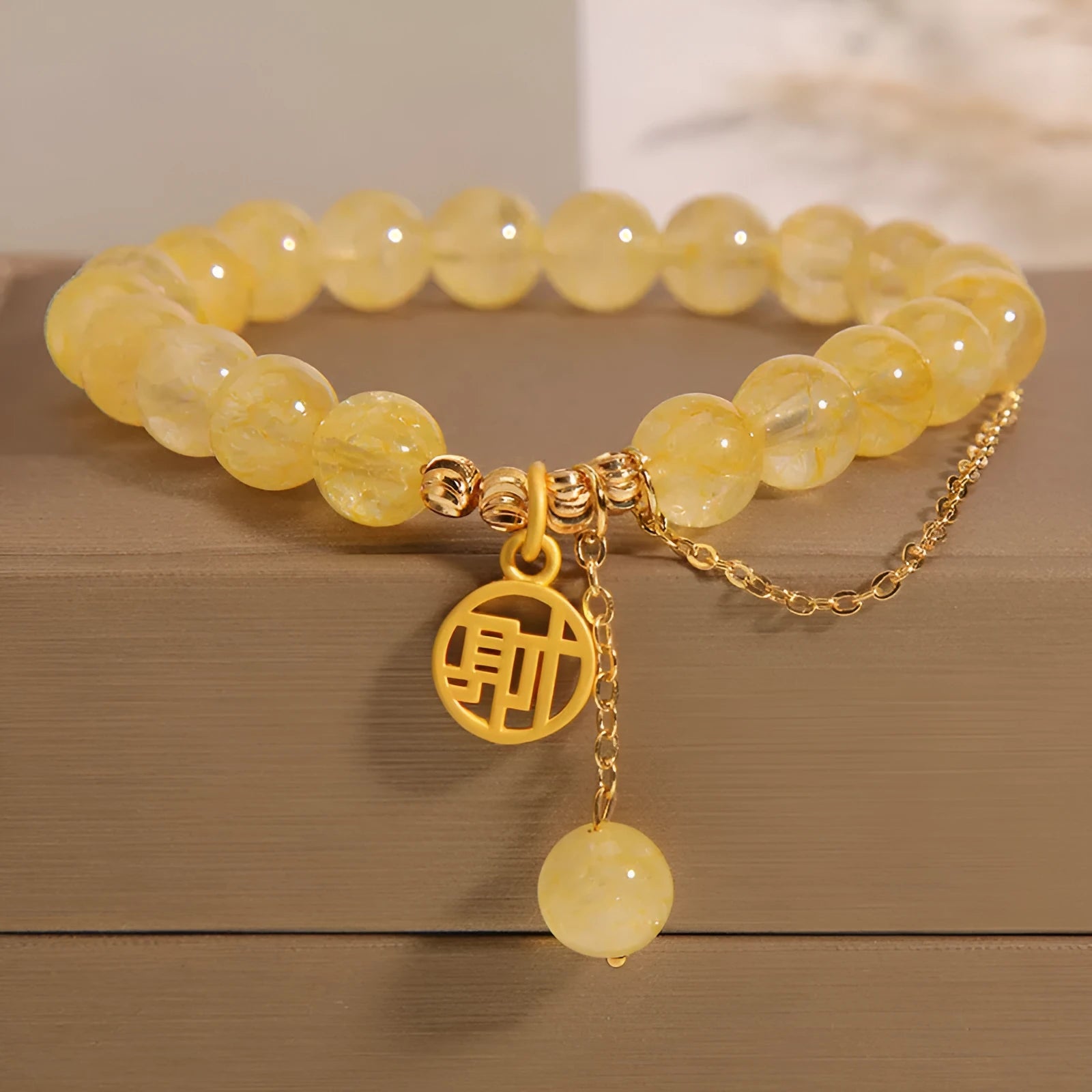 Citrine Chinese character bracelet with tassel detailing showing Caizi and Fu design options
