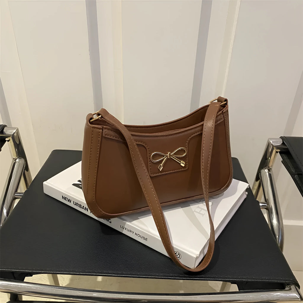 PU leather Western style baguette shoulder bag with bow detailing in six colour options
