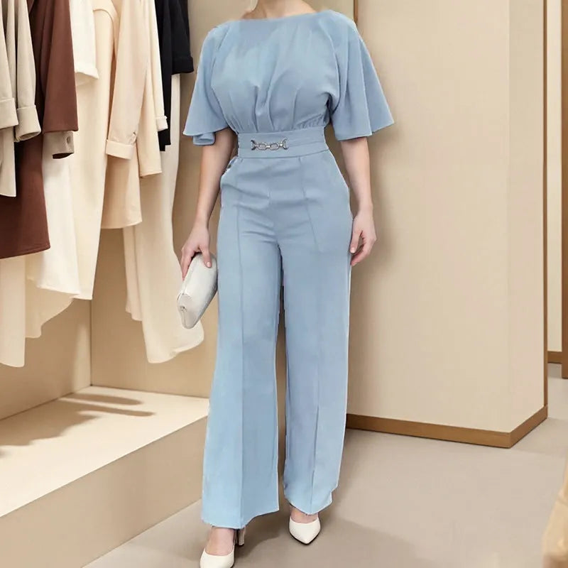 Blue men's casual suit with long sleeves and trousers on a hanger