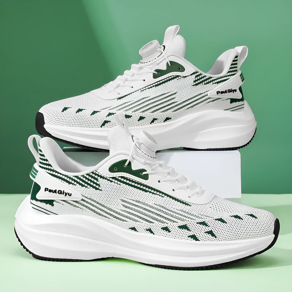 Men's white and green casual running shoes with fly-kit mesh, rotating buckle, and flat TPU sole.