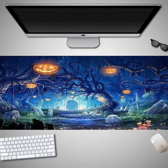 Large Halloween patterned gaming mouse pad on a desk showing non-slip rubber base and extra-long design.