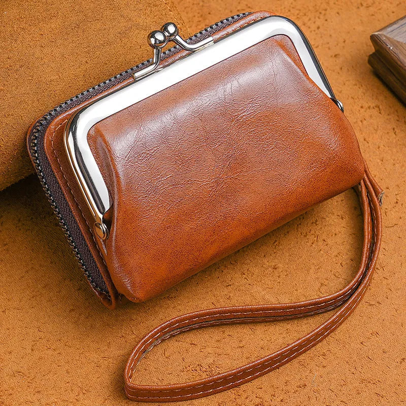 Ladies' synthetic leather buckle coin purse with metal clip, shown in five colour options.