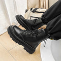 Men's black frosted leather Dr Martens platform boots with a side zip and 8-hole high top design.