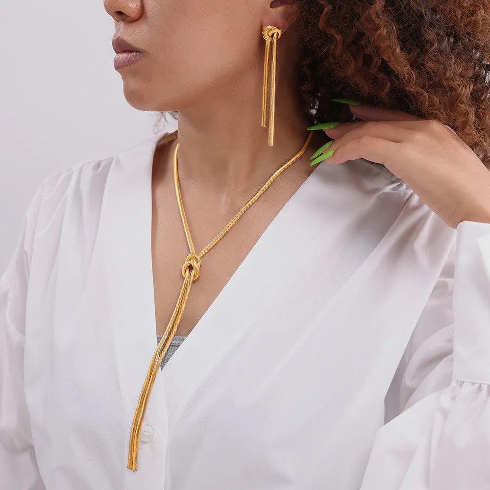 Gold knotted tassel snake chain long necklace with matching titanium steel electroplated earrings