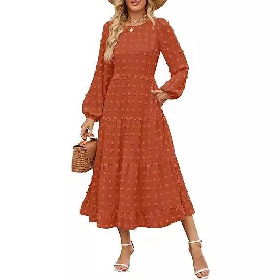 Women's beige long sleeve casual dress with high waist and ruffle sleeves on a model.