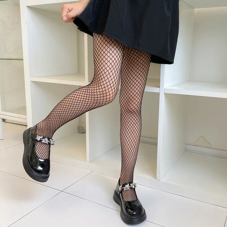 Women's mesh stockings in large, medium and small patterns in black and white colours