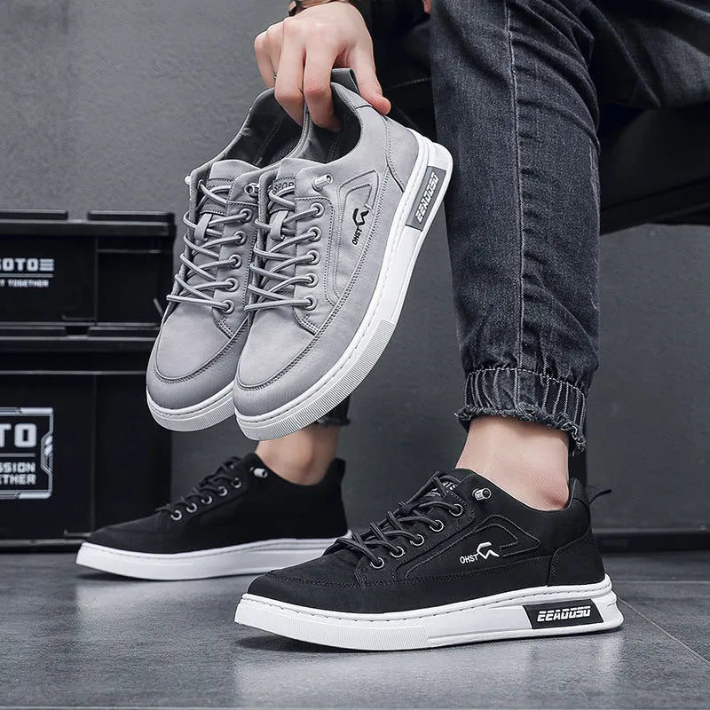 Men's grey canvas casual sneakers with round toe and low-top design featuring breathable ice silk fabric