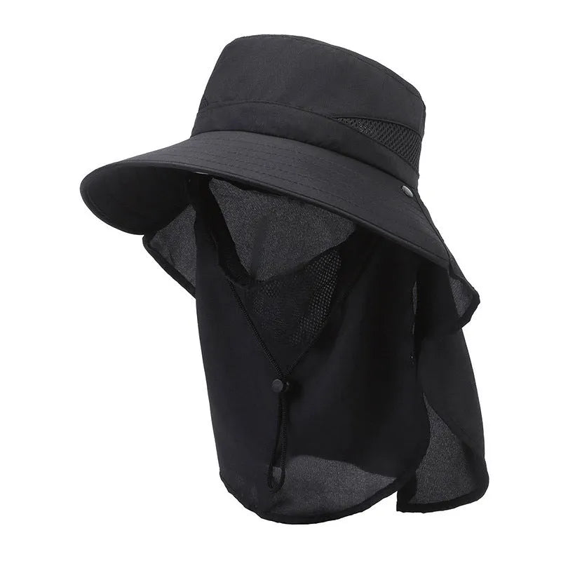 Men's grey fisherman hat with wide brim, shown from the side on a wooden post outdoors.