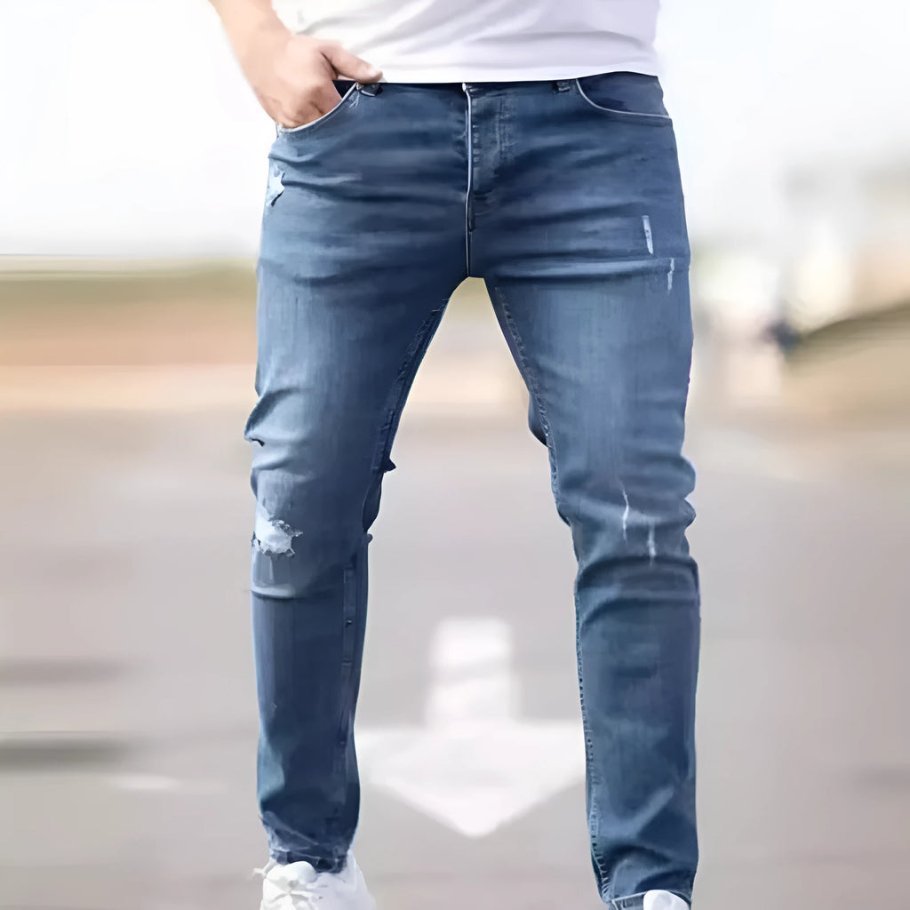 Men's blue cotton denim skinny jeans with medium elasticity, available in sizes S to XXL.