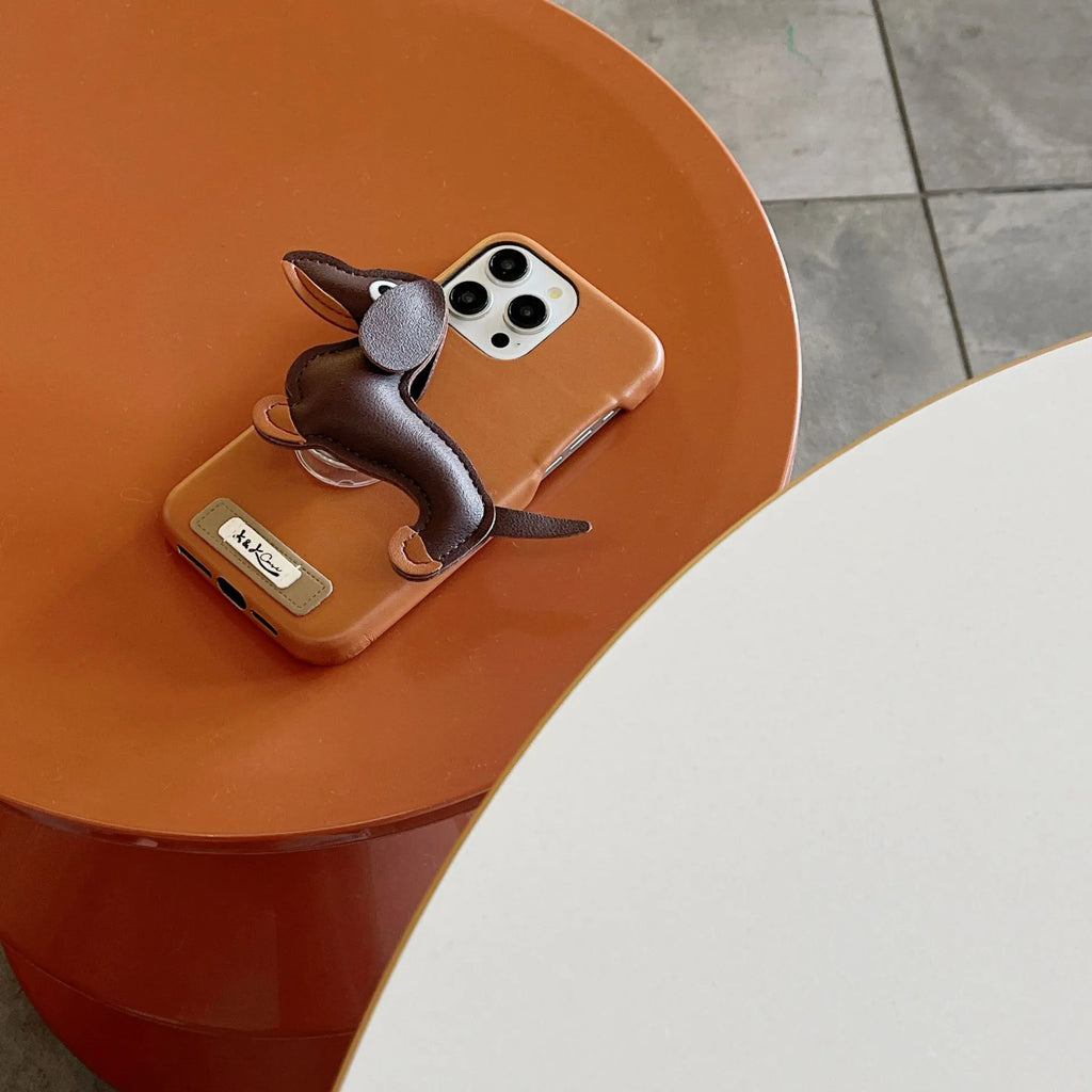 Sausage dog bracket phone case with imitation leather finish in black shell, compatible with iPhone models
