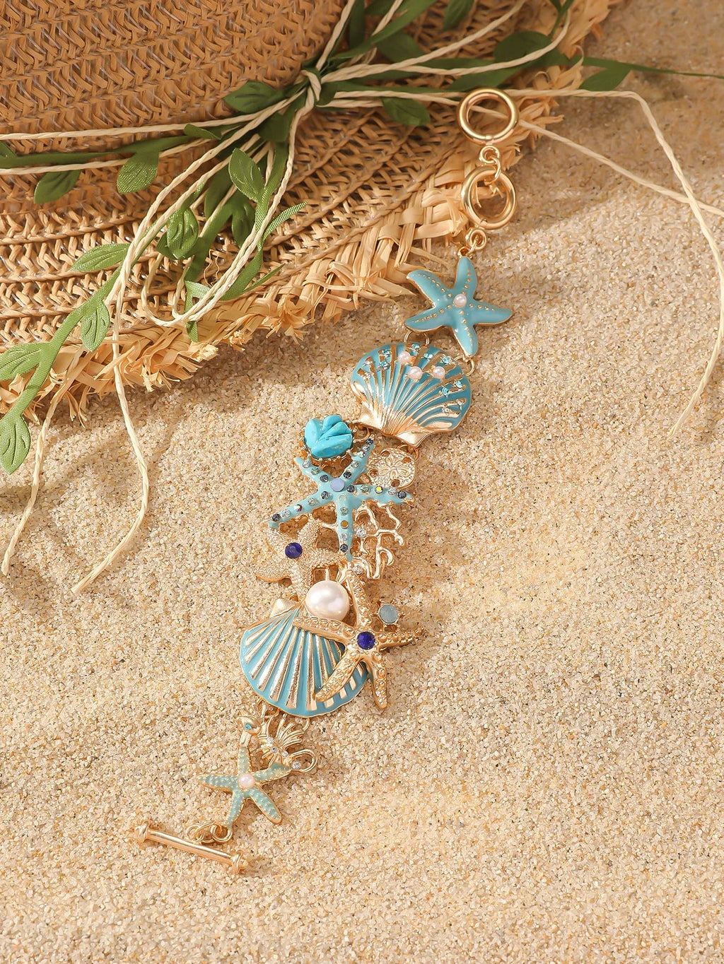 Alloy boat anchor and starfish rhinestone bracelet for women in turquoise, coral red, or coral blue.
