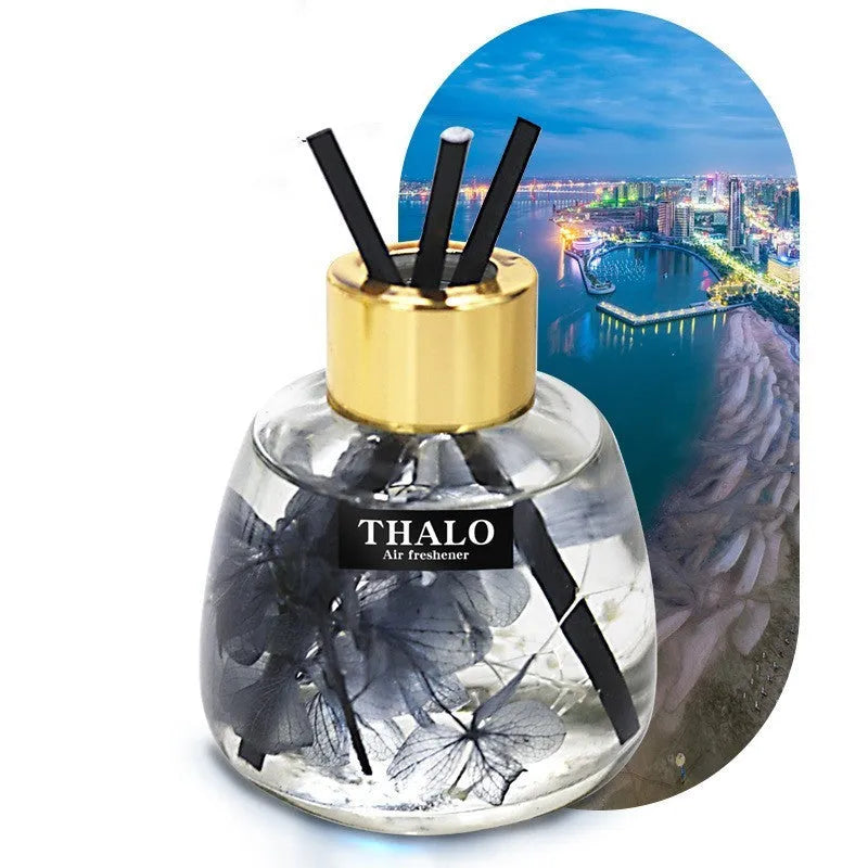 Glass bottle car perfume ornament with loose incense in decorative colours.