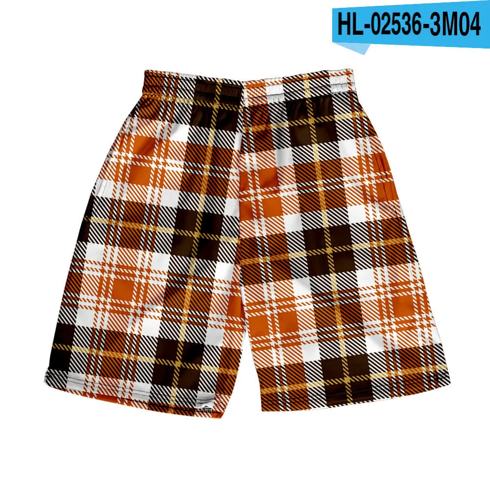 Man wearing straight-leg plaid shorts with an elastic waistband on a beach, showing one of twenty available colour variations.