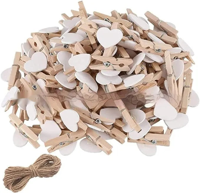 Set of five solid wood heart-shaped hair clips in red, white, and rose red on a plain background.