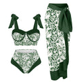 Women's pink floral print three-piece swimsuit set with skirt on a mannequin.