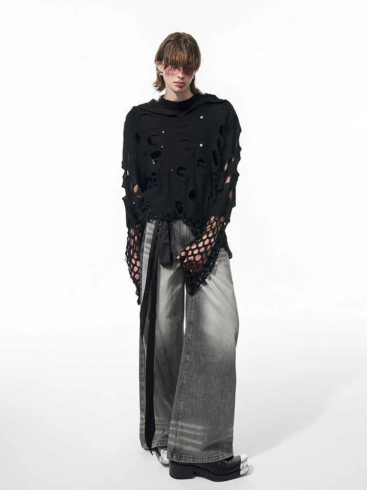 Men's black loose-fit hoodie with hollow hood design and pearl decorative trim on the front.