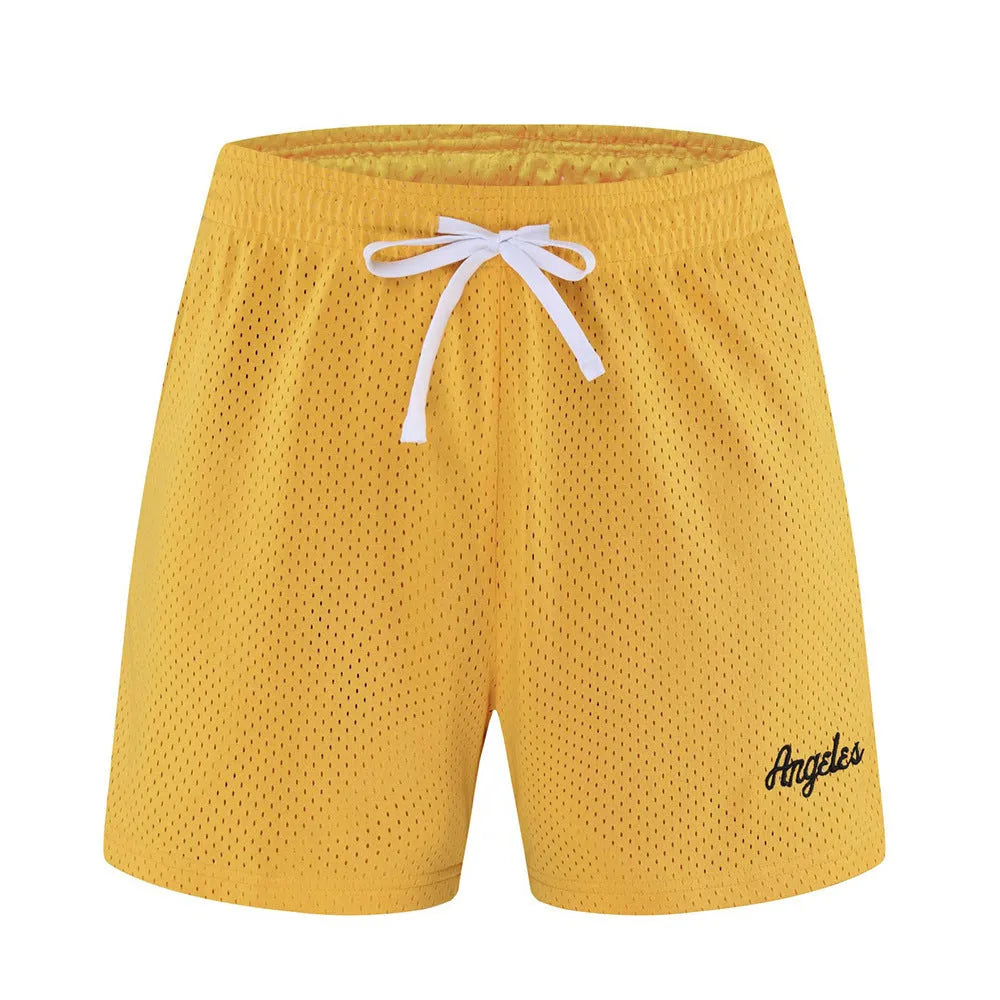 Men's black double-layer mesh sport shorts made from polyester fabric.
