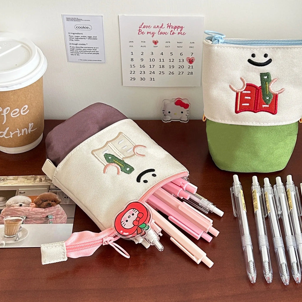Cartoon Korean style collapsible pencil case in Oxford fabric measuring 17x14cm