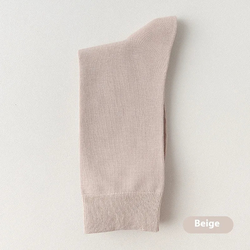 Mid-calf men's business socks in combed cotton available in twelve solid colours