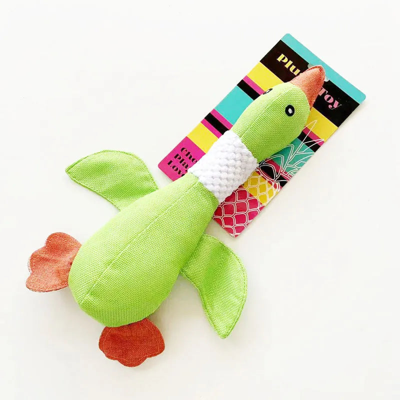 Blue plush duck dog toy with squeakers for chewing and fetch play.