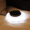 Blue Bluetooth desk lamp speaker with touch controls showing white, yellow and blue light options