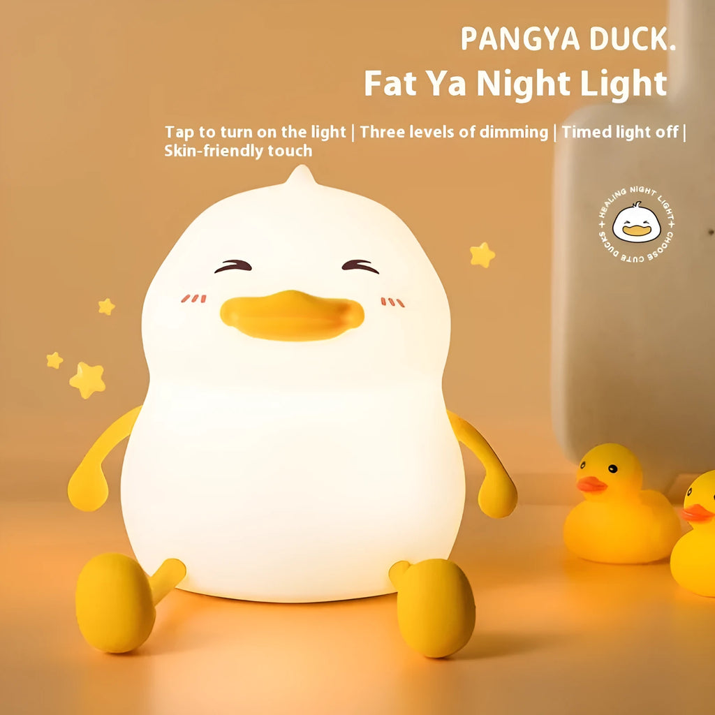 Chubby Night Light portable LED desk lamp on a wooden table showing soft glow and compact design