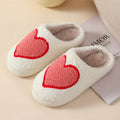 Women's plush round toe slippers with a PVC sole in Big Love colour.