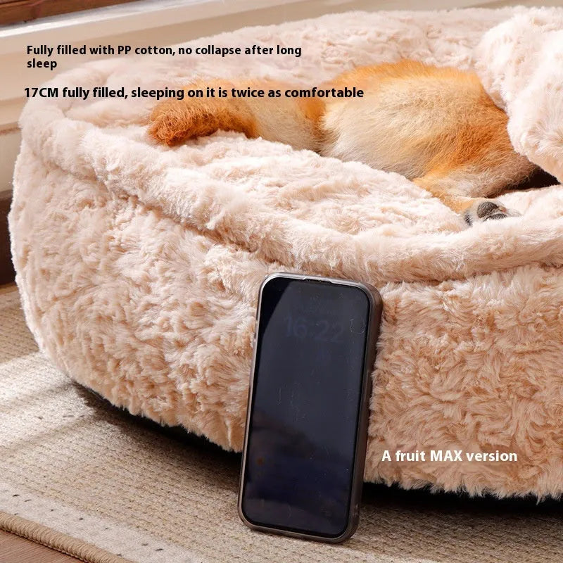 Small milk tea coloured fabric dog kennel with a round nest design on a wooden floor.