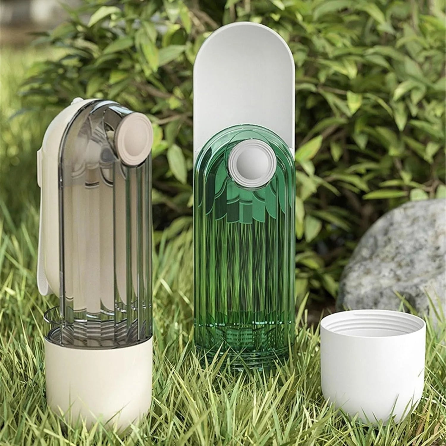 Beige foldable dog water bottle with food dispenser base shown extended and compressed