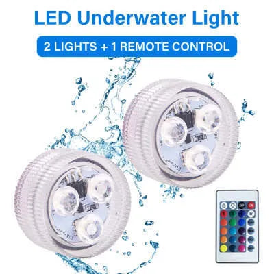 Small rectangular white LED aquarium light with remote control on a blue background.