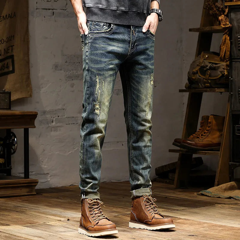 Men's skinny fit stretch denim jeans in a retro blue wash with a five-pocket design.