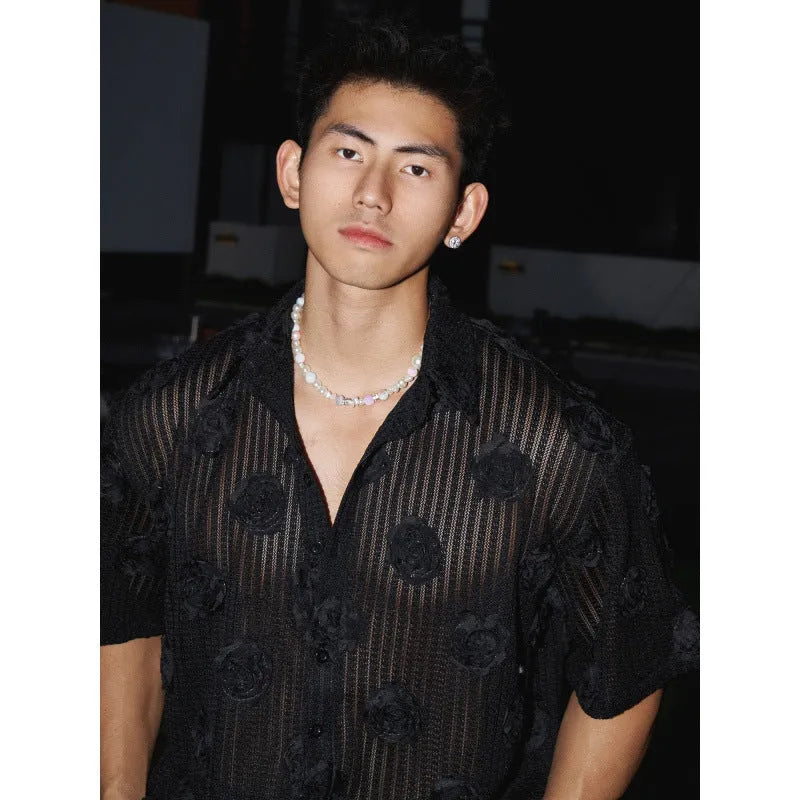 Loose fit short sleeve shirt with 3D floral pattern in milky white colour, shown on mannequin