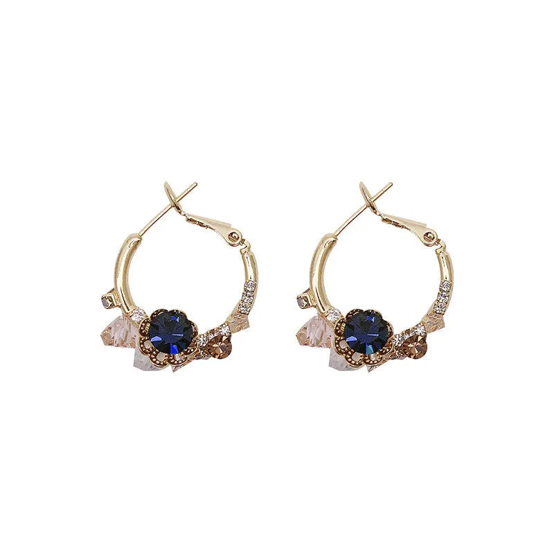 Green flower earrings with real gold plating, 925 silver needle, and diamond processing on an alloy body, gold colour