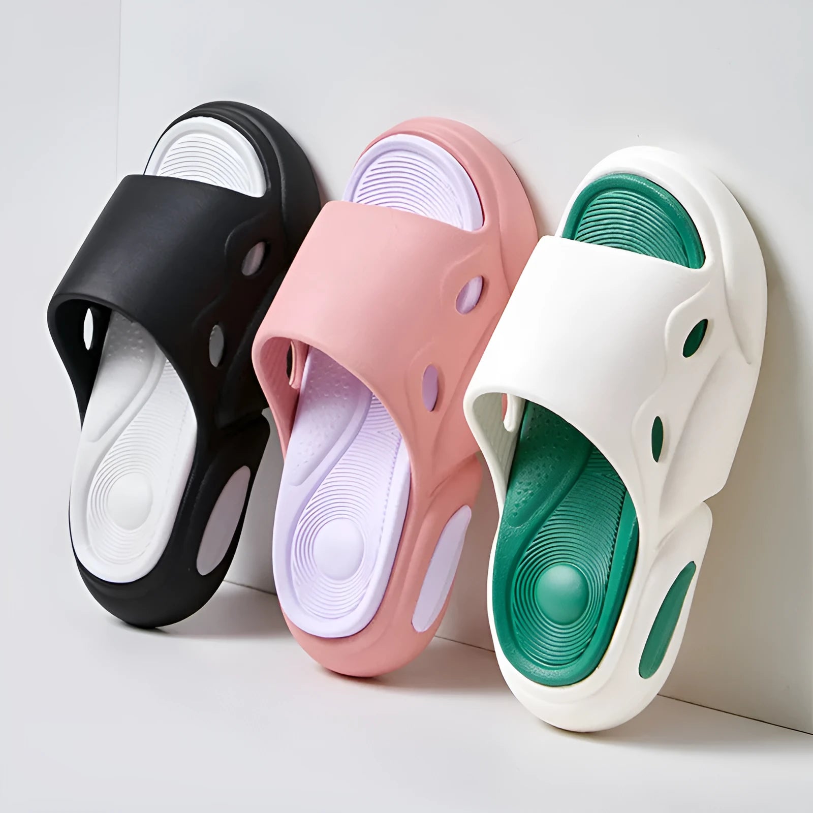 Two-colour thick-soled EVA slippers with leather lining in Pink Purple colourway.