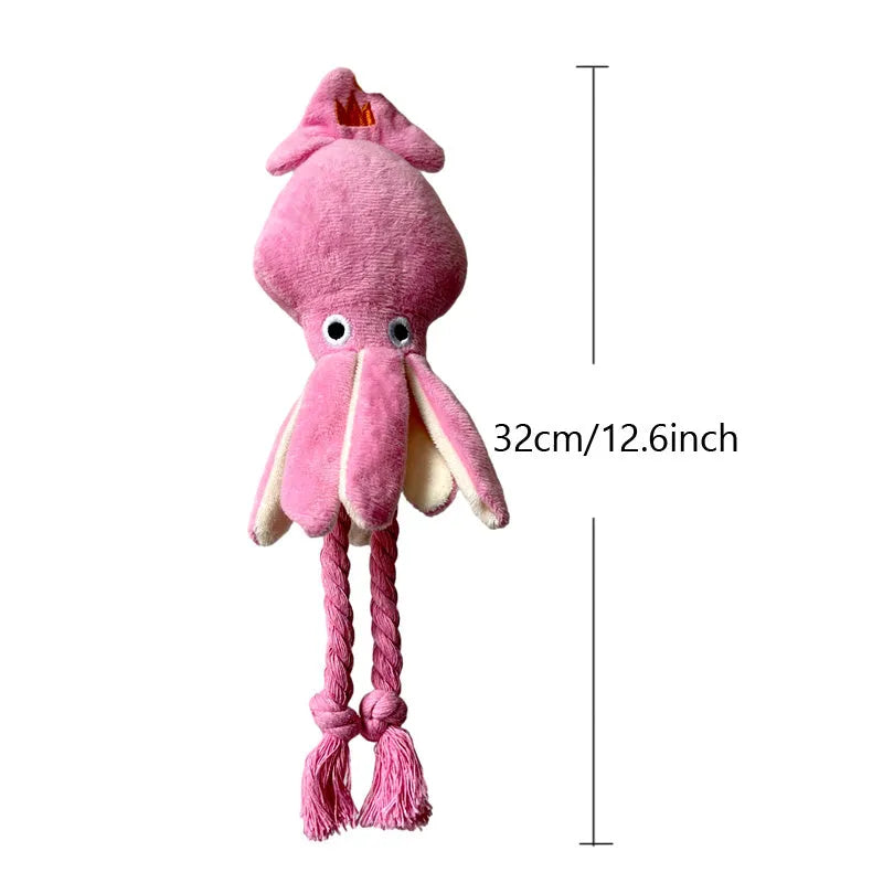 Pink squid-shaped corduroy dog chew toy with a squeaker.