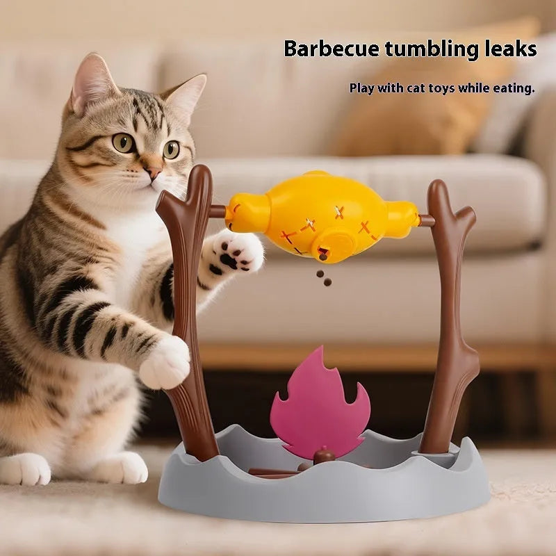 Barbecue-themed tumbling cat food feeder toy with leakage mechanism for freeze-dried treats