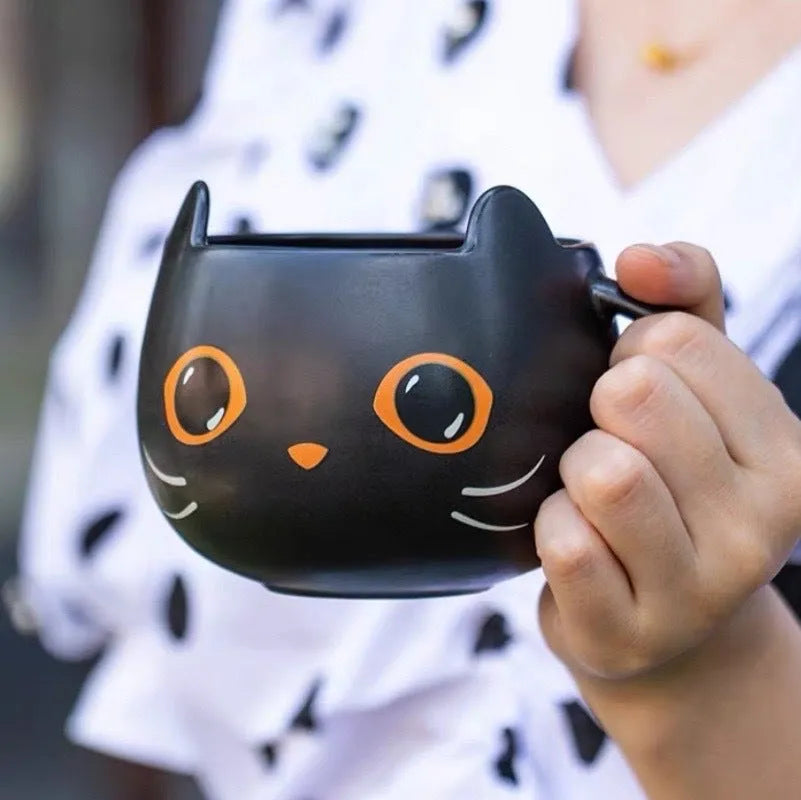 Black cat-shaped ceramic mug with pumpkin decoration and 355ml capacity