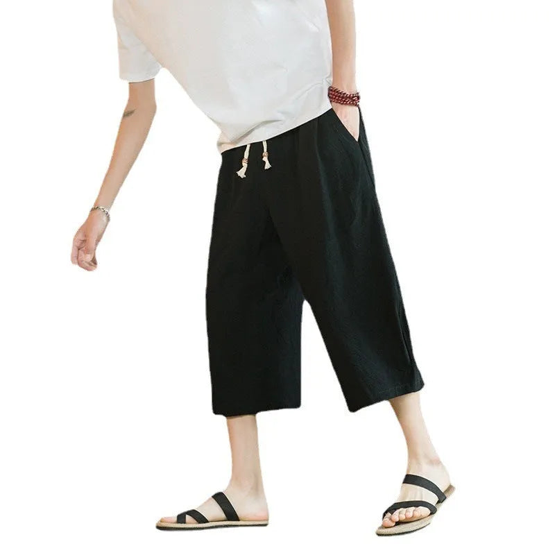 Women's plus size linen summer shorts in straight leg skinny fit, shown in khaki colour.