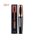 Black waterproof mascara tube creating thick, long curled lashes with sweat and smudge resistance