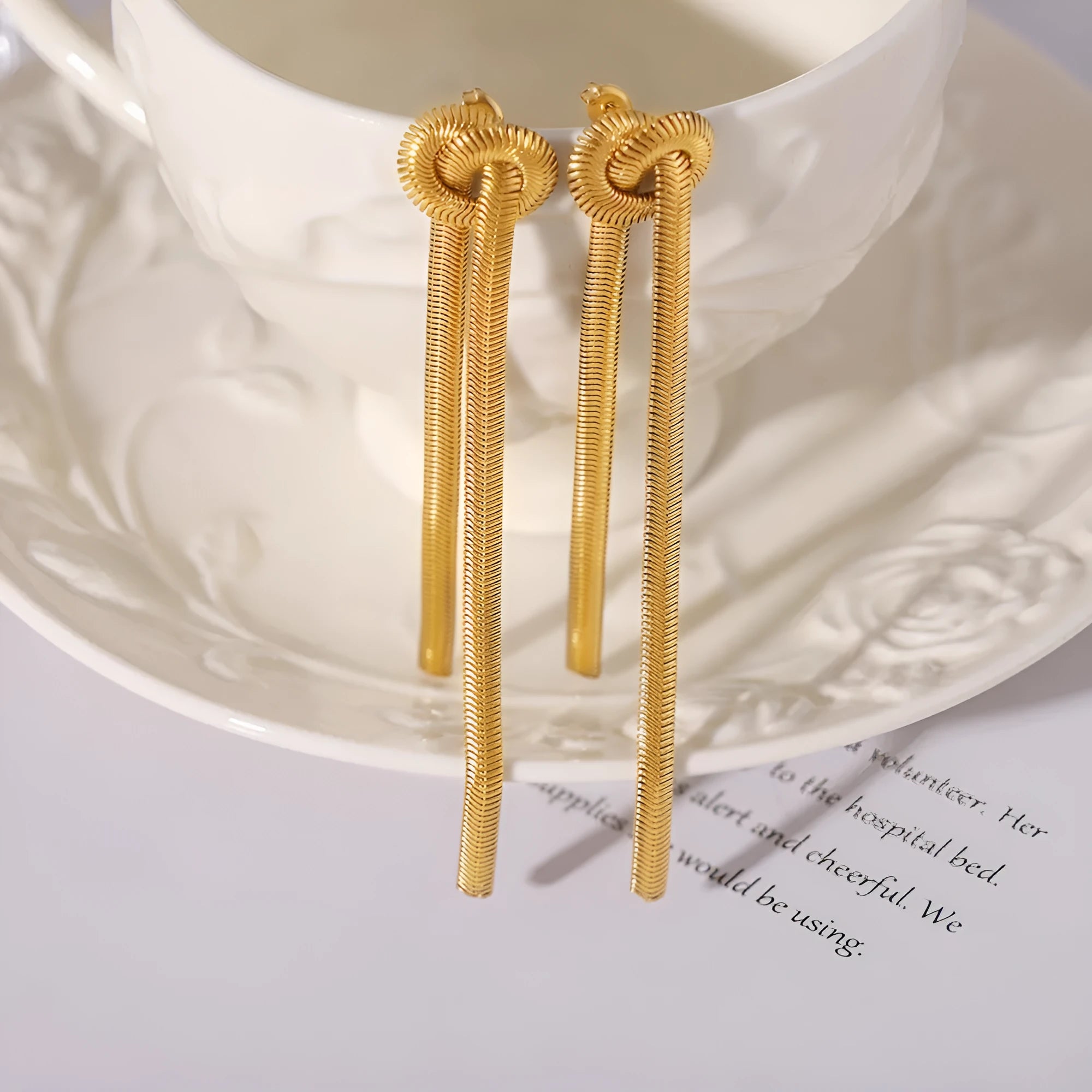 Gold knotted tassel snake chain long necklace with matching titanium steel electroplated earrings