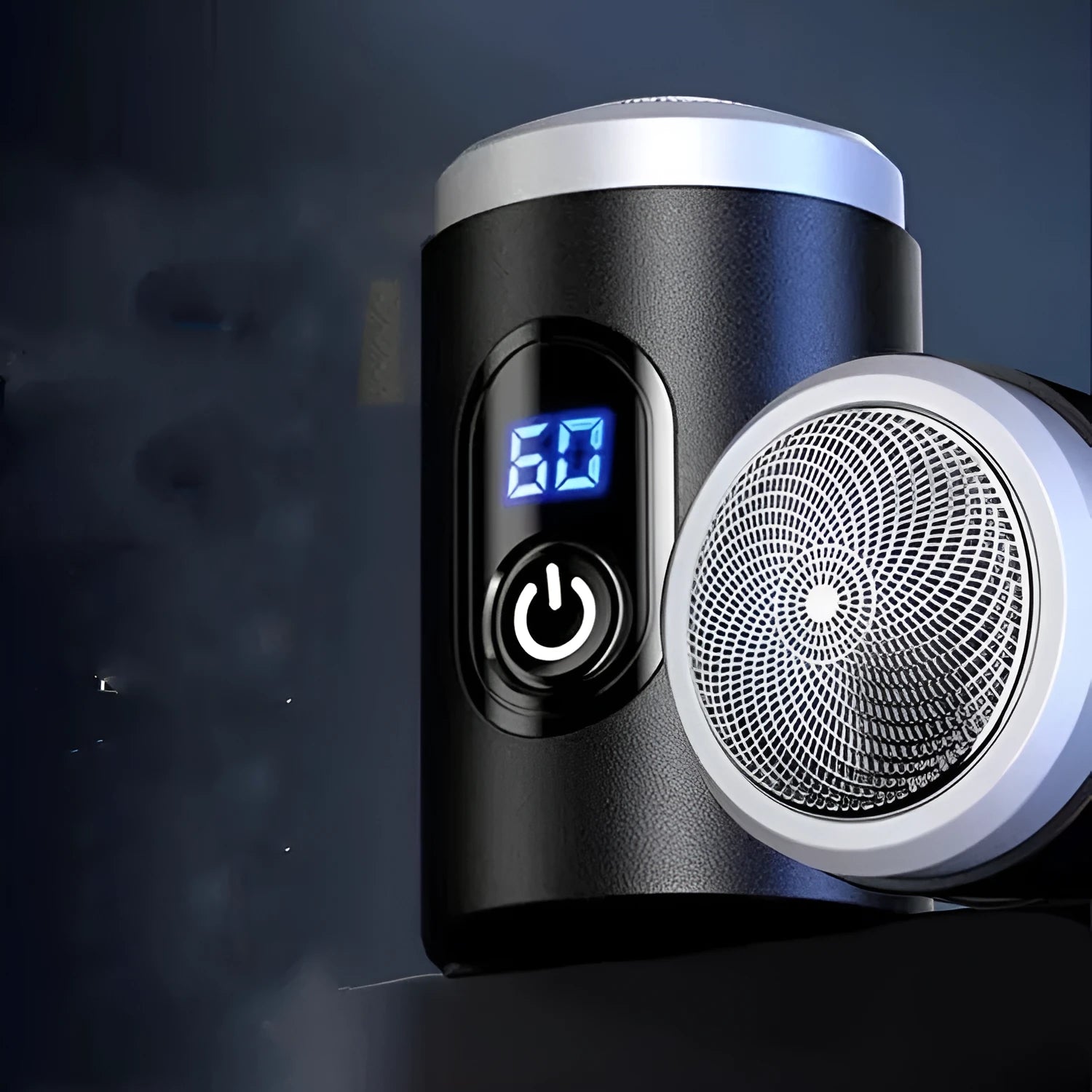 Black mini USB rechargeable electric shaver with cleaning brush and charging cable on a white background.