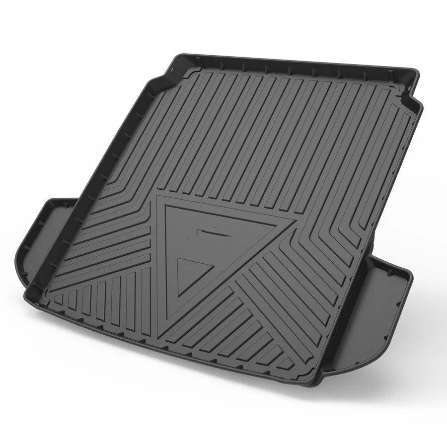 Black TPE car boot liner mat with a carbon fibre pattern texture, laid flat.