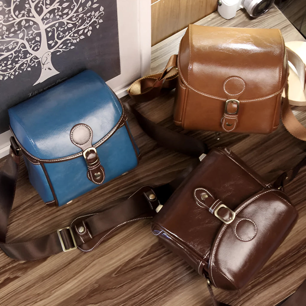 Single shoulder SLR camera liner bag in PU leather with polyester cotton insert, shown in reddish brown