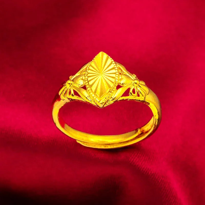 Alluvial gold coloured open diamond flower ring with geometric texture on brass metal