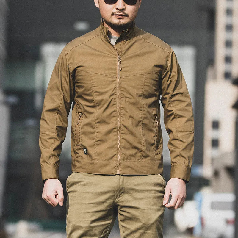 Men's brown polyester Outdoor Tactics Assassin Jacket with a camouflage pattern option displayed.