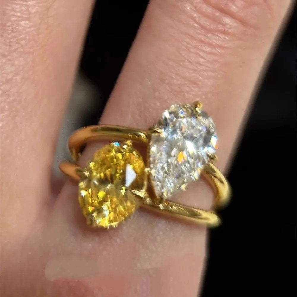 Women's geometric open copper ring with water drop double sheng stone zircon setting in contrast colours