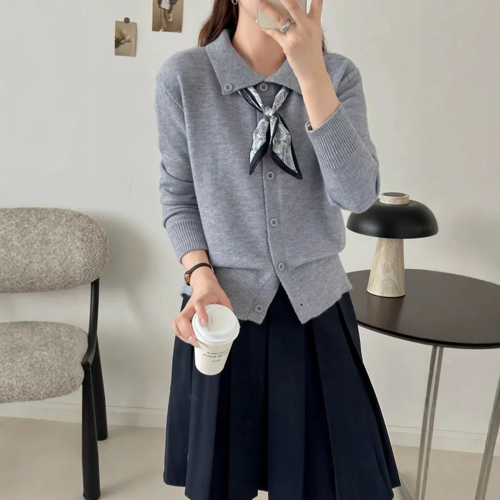 Lapel scarf sweater cardigan in acrylic knit, shown in milky white with splicing detail and long sleeves.