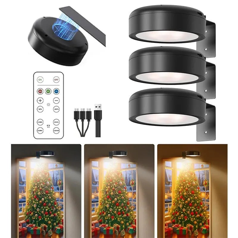 Black magnetic wireless LED lamp with remote control mounted next to a painting on a wall.