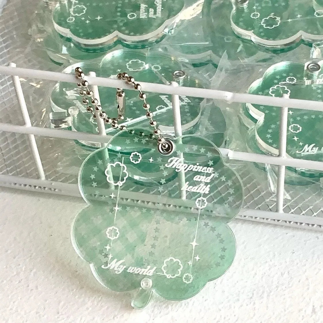 Acrylic four-leaf clover keychain pendant in blue, green, or mint green